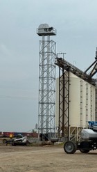 Installed of Bucket Elevators with Safety cage and support structures from Farm Equipment Plus